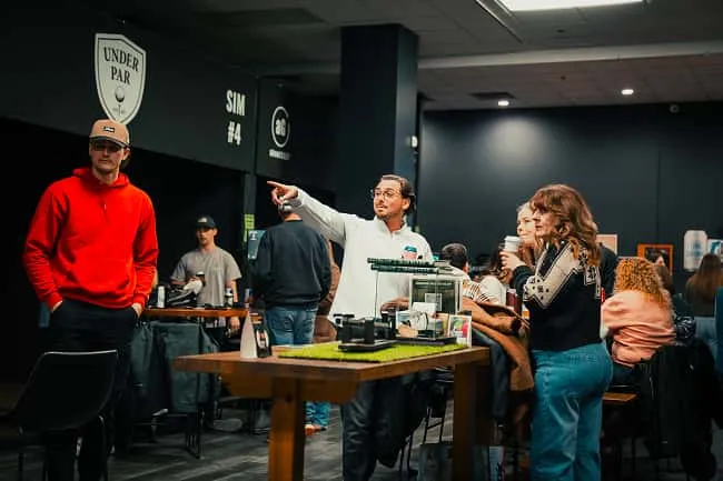 Friends together at a private event at Under Par Golf